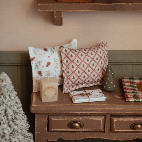 Cojines con estampados navideños.