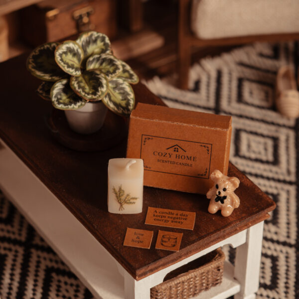 Caja de vela aromática, osito y decoración