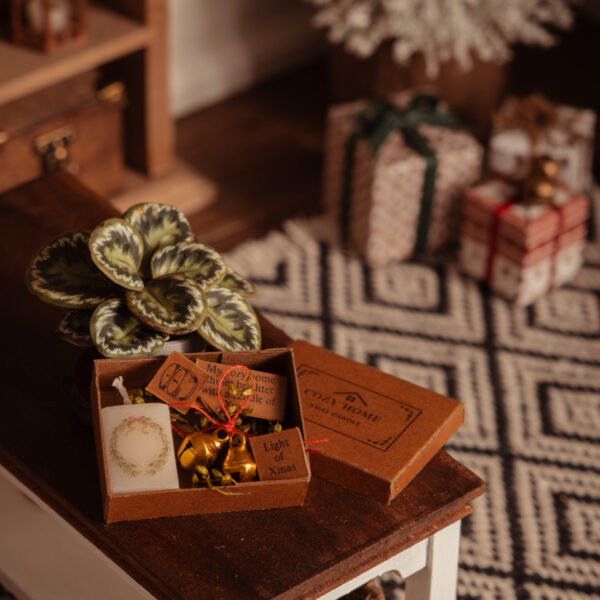 Caja de vela aromática navideña, cascabeles y decoración