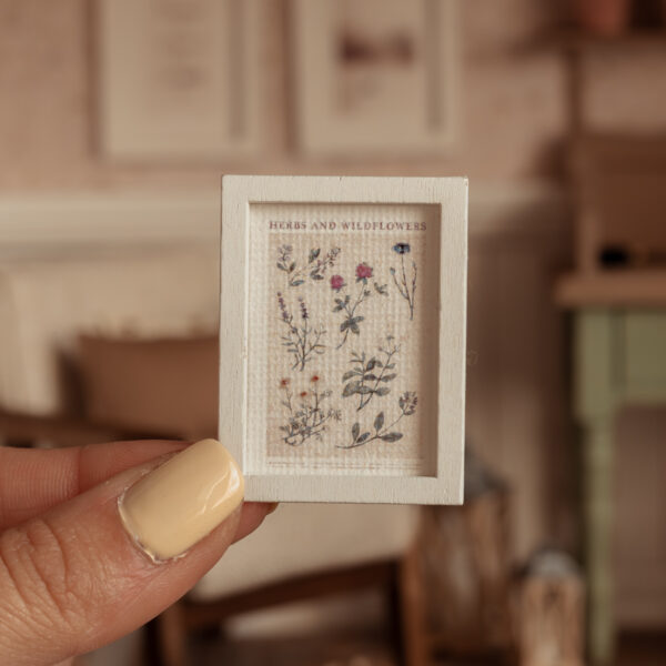 Cuadro con marco blanco