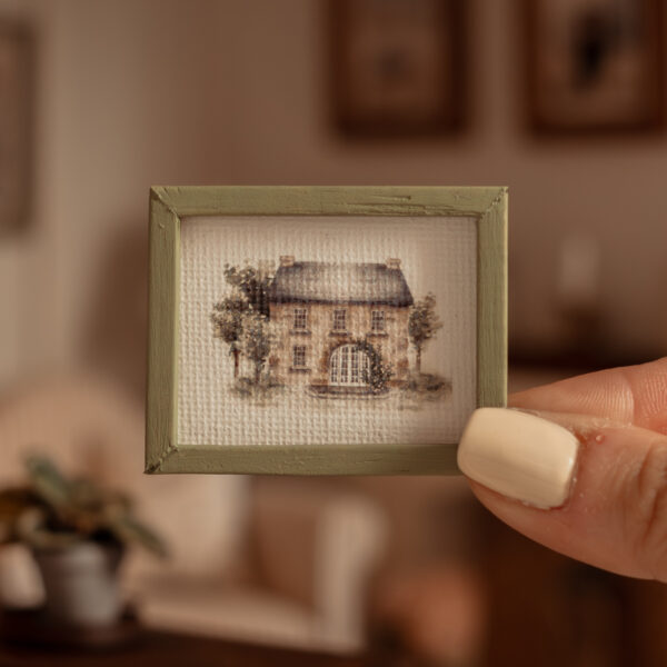 Cuadro con marco en tonos tierra